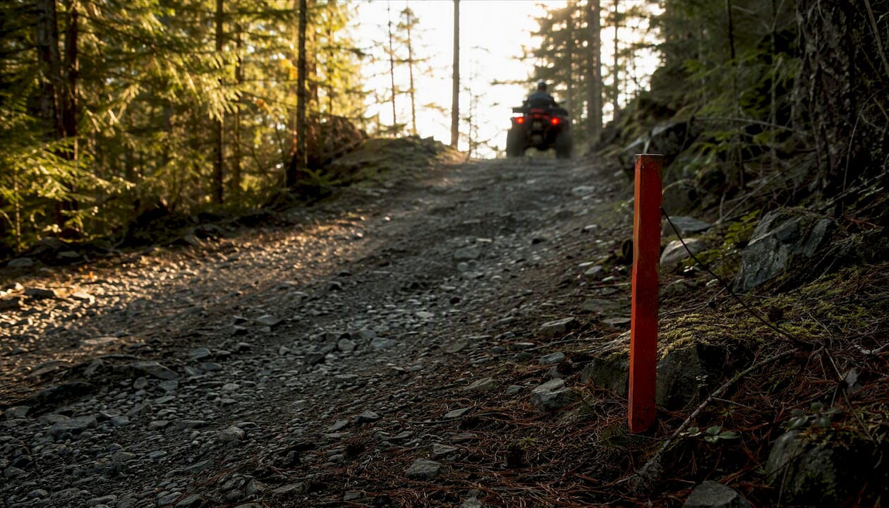 Gravel forest service road with steep incline
