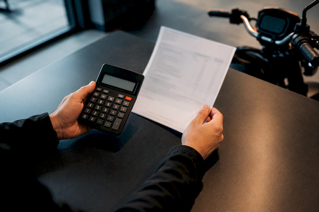 Buyer reviewing powersports financing costs