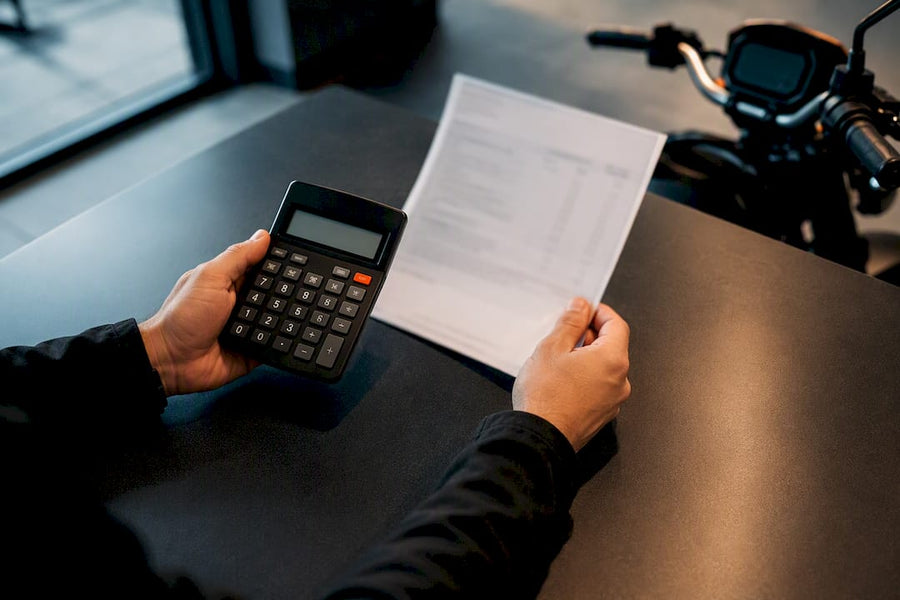 Buyer reviewing powersports financing costs