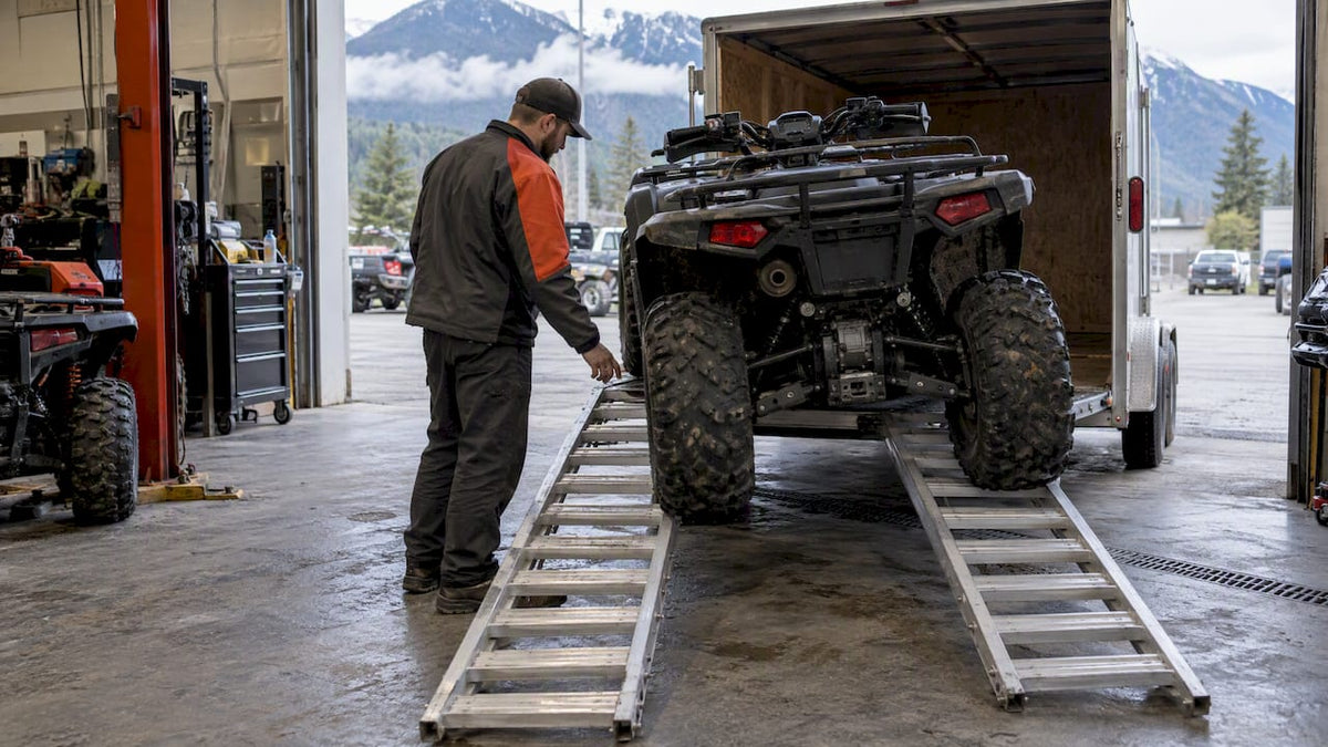 ATV positioned on a loading ramp