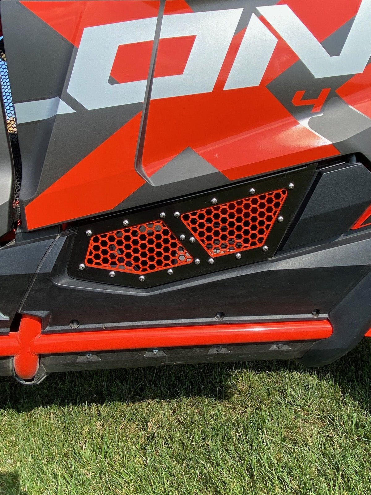 Vented Honda Talon Lower Doors by AJK Offroad Close Up of 4 Door Talon Doors Orange Color